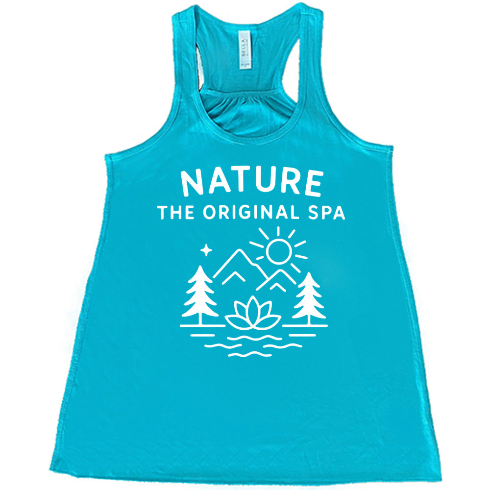 teal flowy tank with the words "nature the original spa" on it, with the mostly line-art graphic of the sun, mountains, trees, a single star, water, and a lotus flower