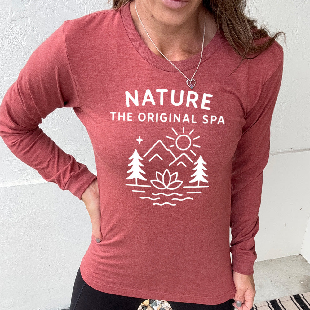 heather clay long sleeve with the words "nature the original spa" on it, with the mostly line-art graphic of the sun, mountains, trees, a single star, water, and a lotus flower