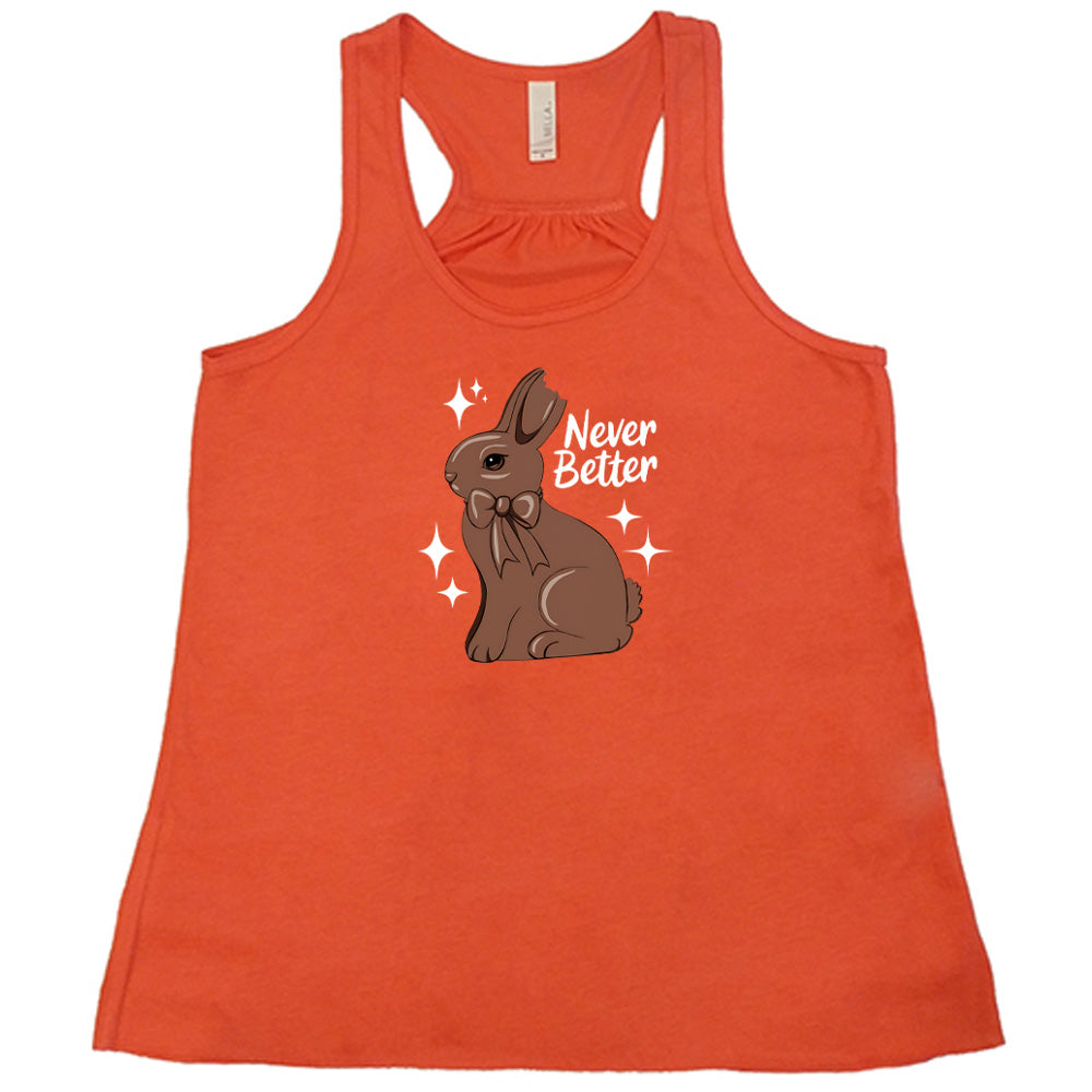 Coral colored flowy tank with a chocolate bunny graphic on it that says "Never Better"