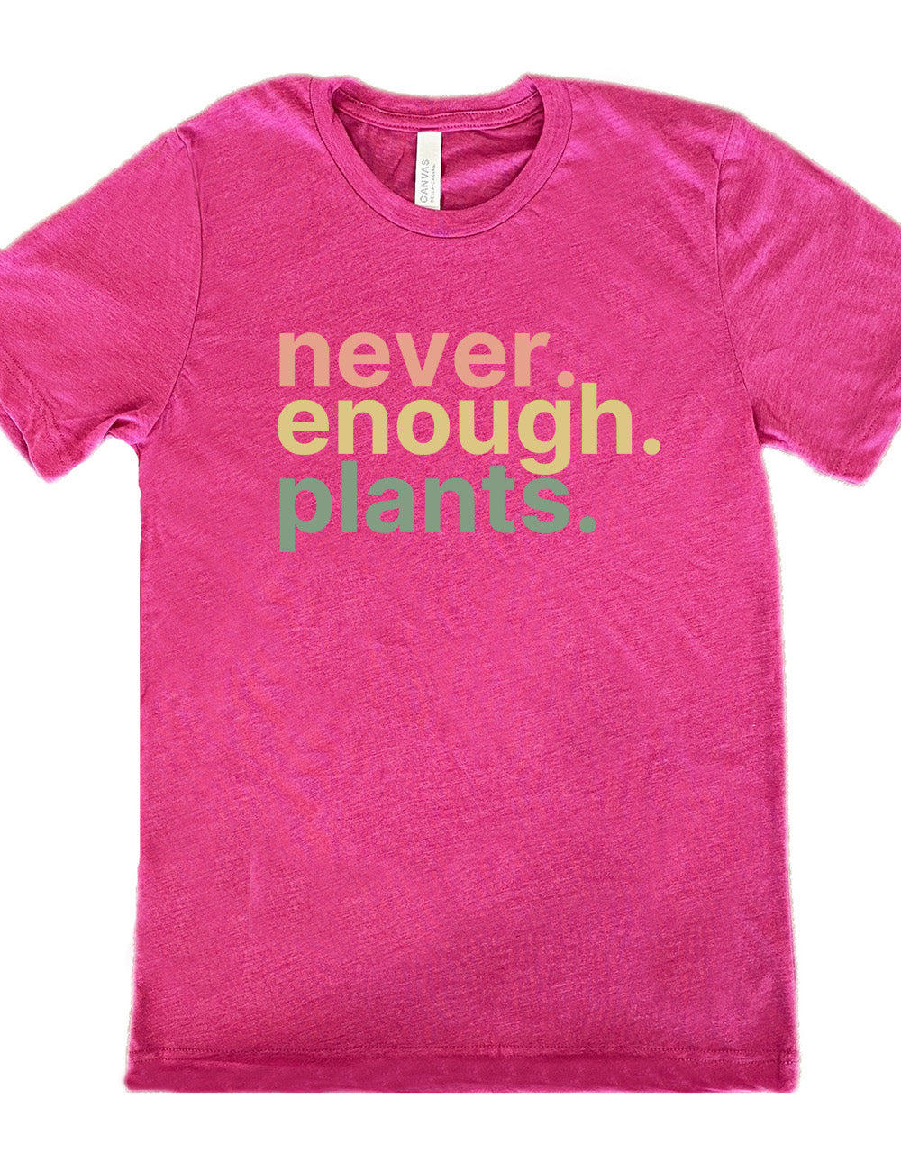 berry unisex tee with three words stacked on top of each other, with periods, that say "never. enough. plants."
