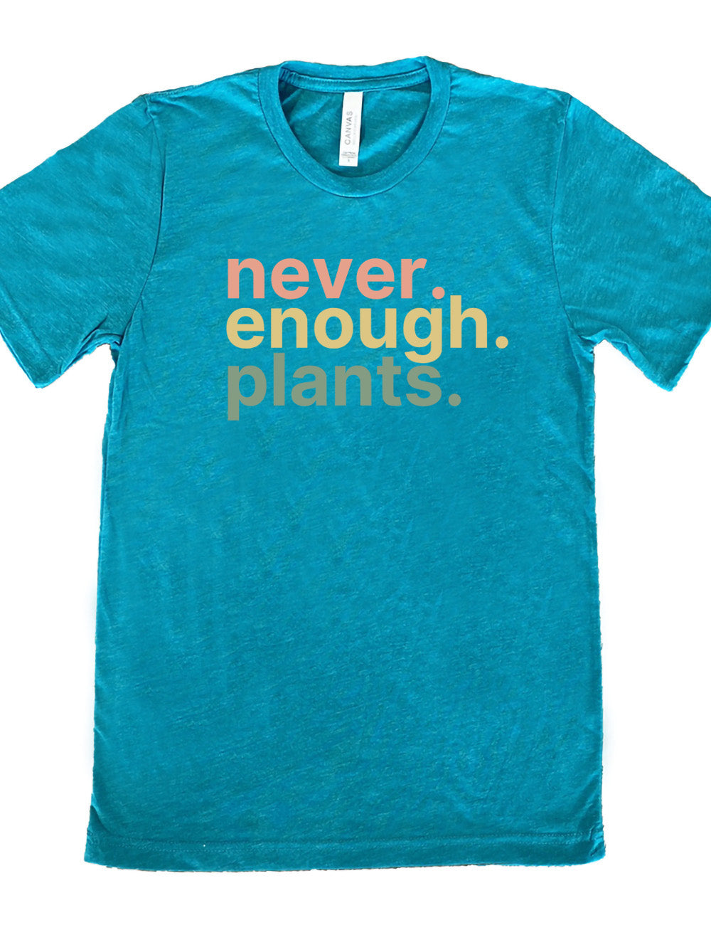 teal unisex tee with three words stacked on top of each other, with periods, that say "never. enough. plants."