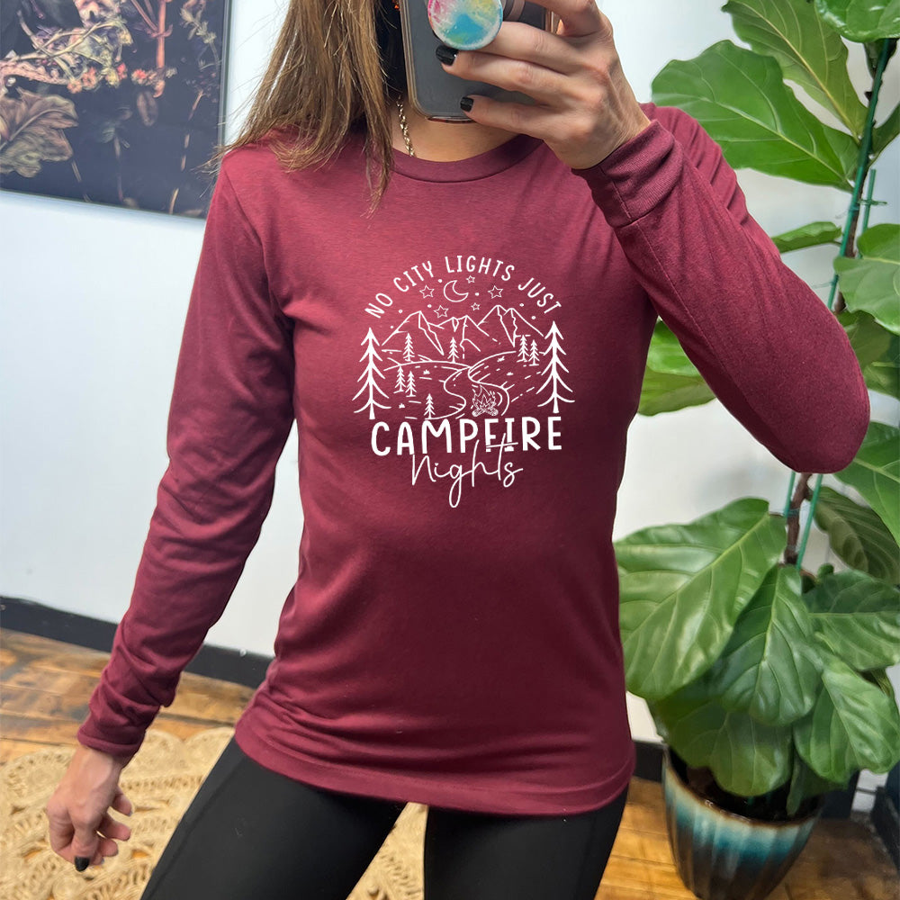 Heather cardinal long sleeve shirt with a stars and mountain graphic on it that says "No City Lights Just Campfire Nights"