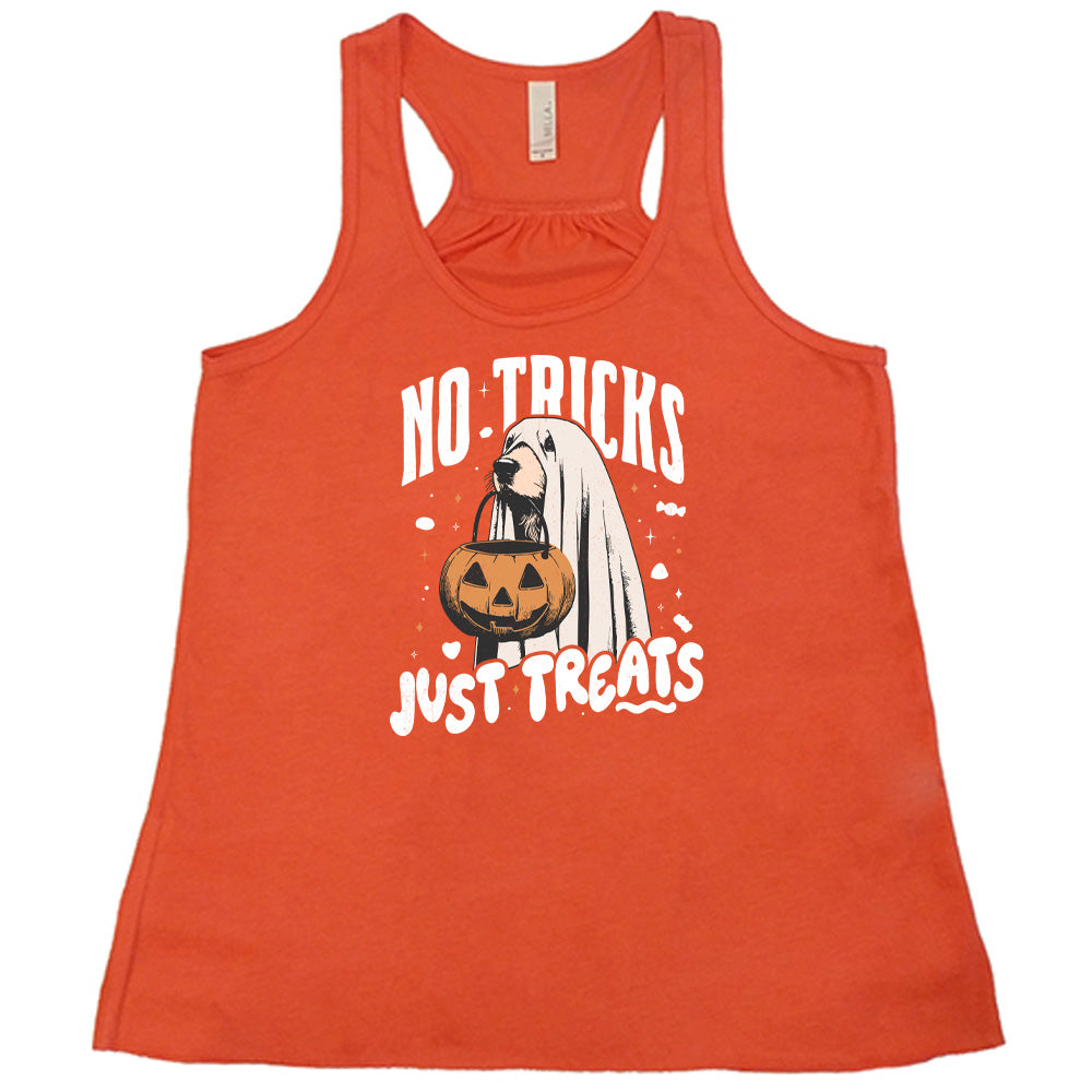 Coral colored flowy tank with dog wearing a sheet and a candy bucket in its mouth graphic on it that says "No Tricks Just Treats"