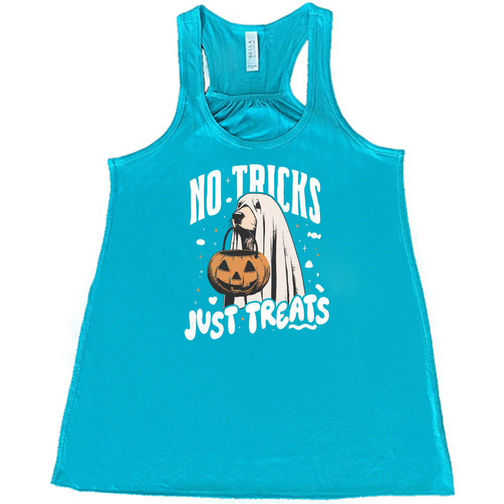 Teal colored flowy tank with dog wearing a sheet and a candy bucket in its mouth graphic on it that says "No Tricks Just Treats"