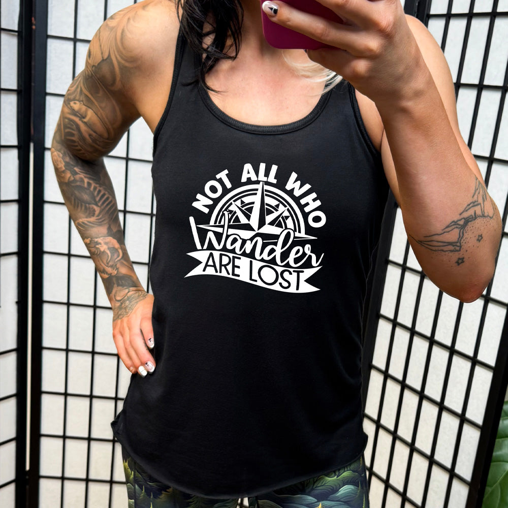 Black colored flowy tank with a compass graphic on it that says "Not All Who Wander Are Lost"