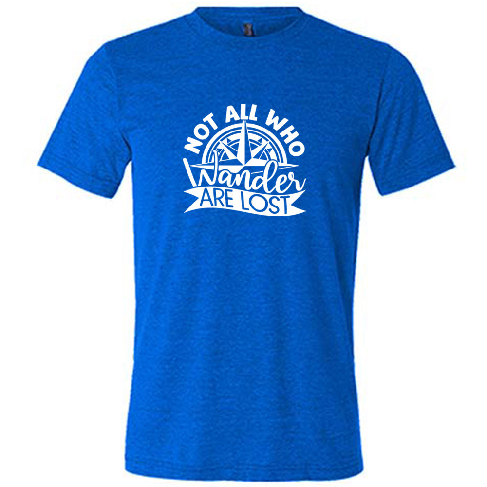 Blue colored shirt with a compass graphic on it that says "Not All Who Wander Are Lost"