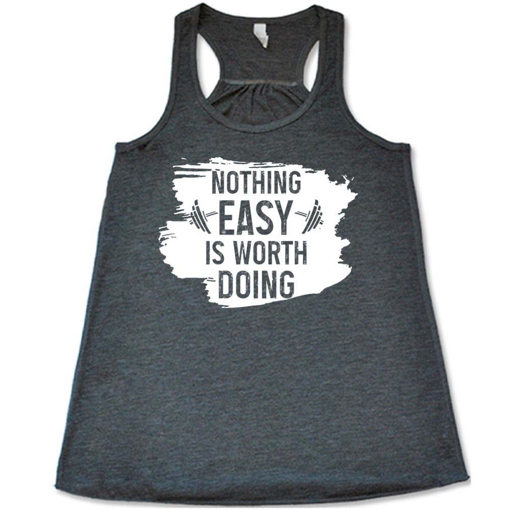 Grey Flowy Tank, with wording Nothing Easy is Worth Doing, lettering is color of shirt with barbells all over a white patch