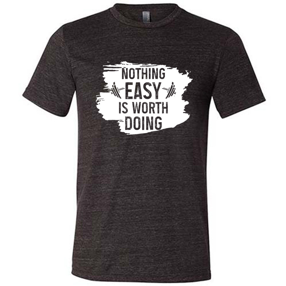 Black Unisex Tee, with wording Nothing Easy is Worth Doing, lettering is color of shirt with barbells all over a white patch