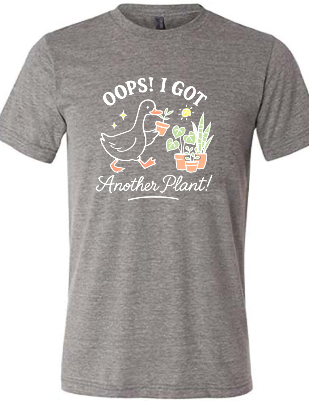 grey unisex tee with the graphic of a goose holding a little plants, walking toward a few other plant, and the words surrounding it saying "Oops! I got another plant!"