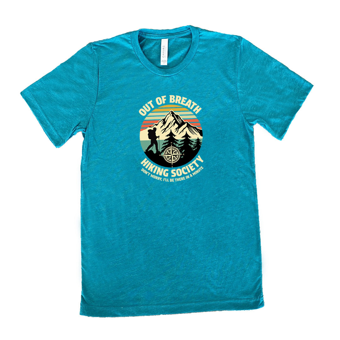 Teal colored shirt with a hiker and mountain graphic on it that says "Out Of Breath Hiking Society"