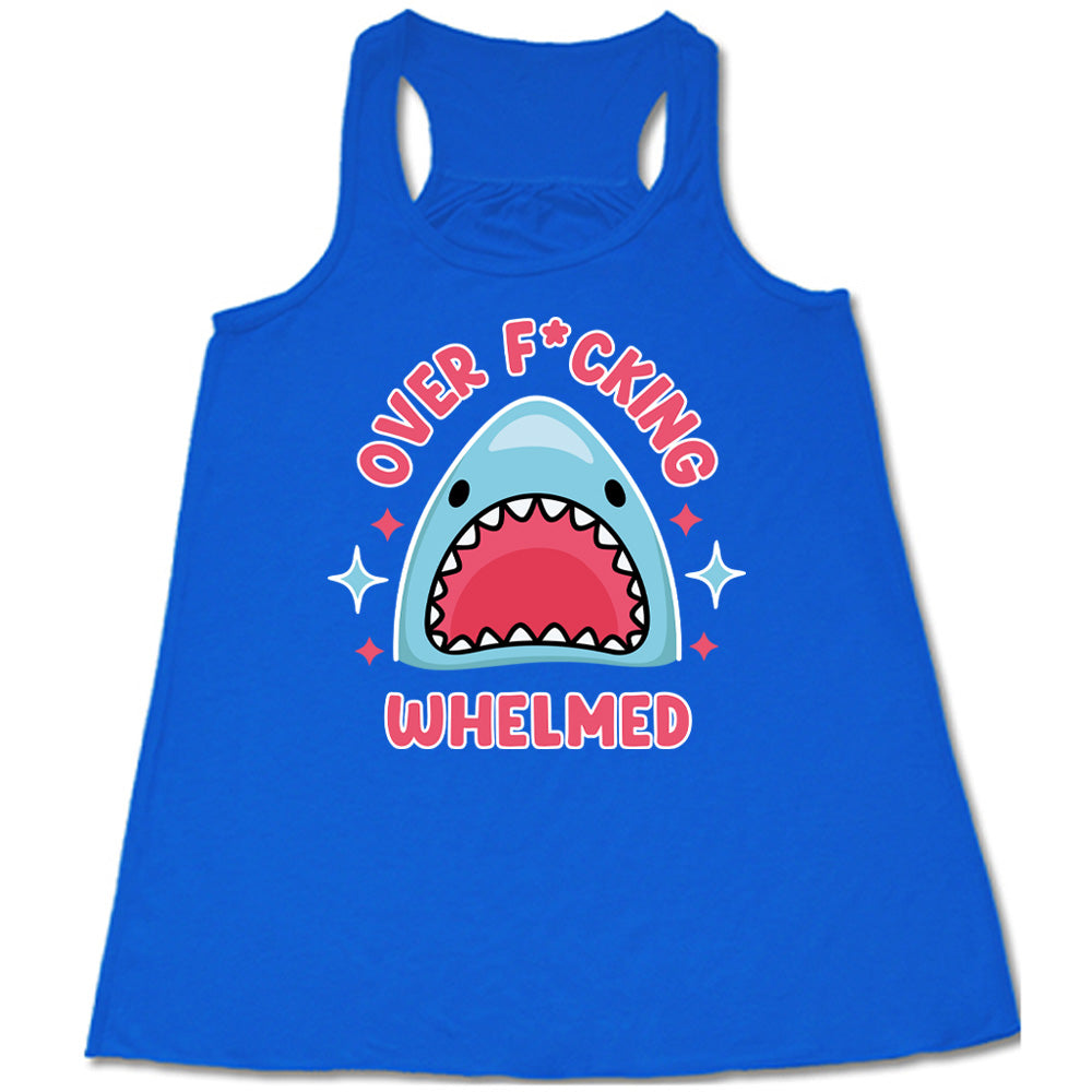 blue racerback flowy tank with the graphic of a shark's head with mouth wide open, and the words around the graphic saying "over f*cking whelmed" and a few stars on the sides