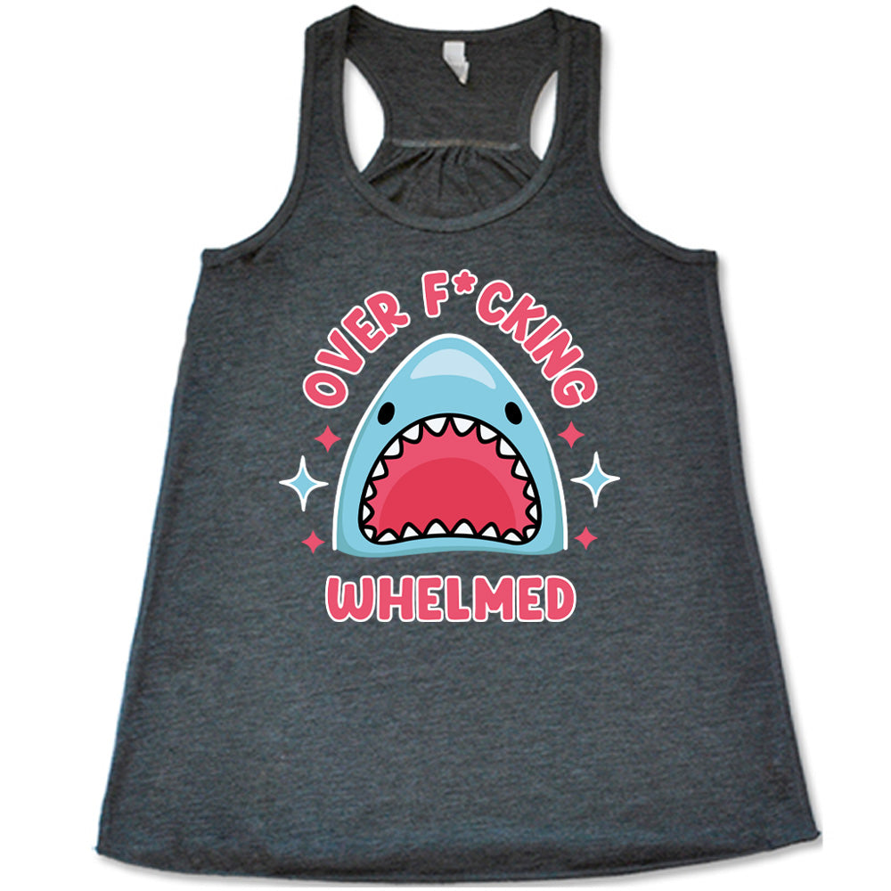 grey racerback flowy tank with the graphic of a shark's head with mouth wide open, and the words around the graphic saying "over f*cking whelmed" and a few stars on the sides