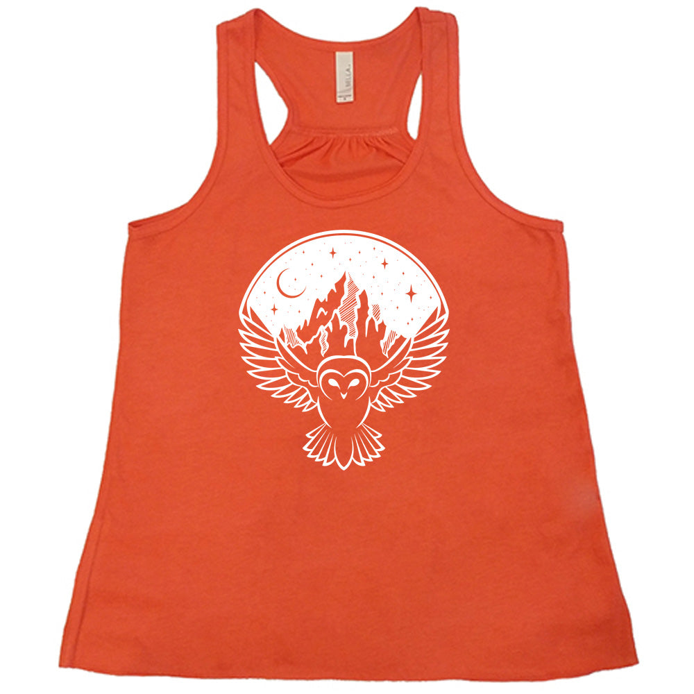 Coral colored flowy tank with night sky owl and mountain graphic on it