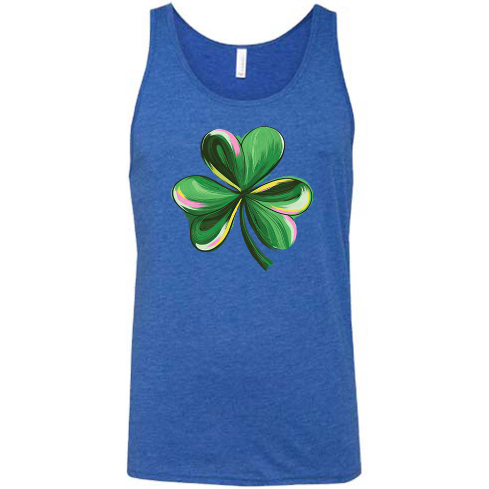 blue shirt with a painted shamrock graphic on it