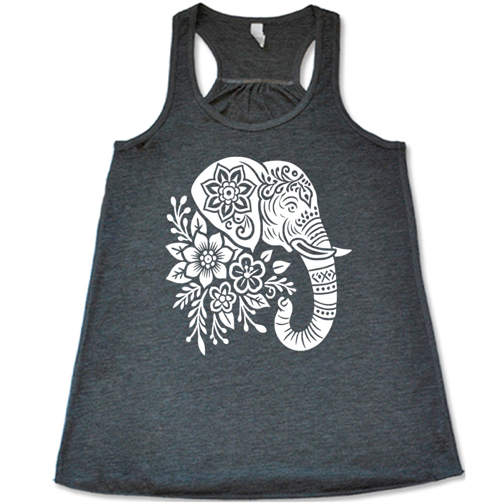grey racerback tank with the large graphic of the profile of an elephant's head, with flowers for a torso, and patterns lining its truck and flowers patterned into its ear and forehead