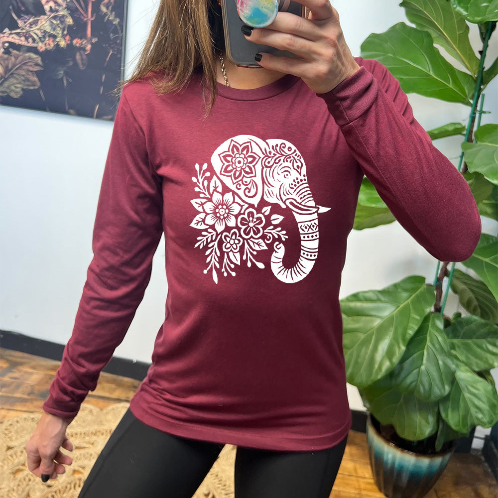 heather cardinal long sleeve tee with the large graphic of the profile of an elephant's head, with flowers for a torso, and patterns lining its truck and flowers patterned into its ear and forehead