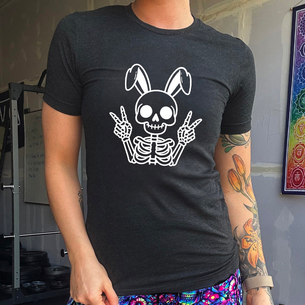 Black colored shirt with a skeleton bunny doing a peace sign graphic on it