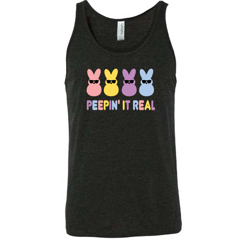 Black colored tank with an Easter-colored bunnies graphic on it that says "Peepin it Real"