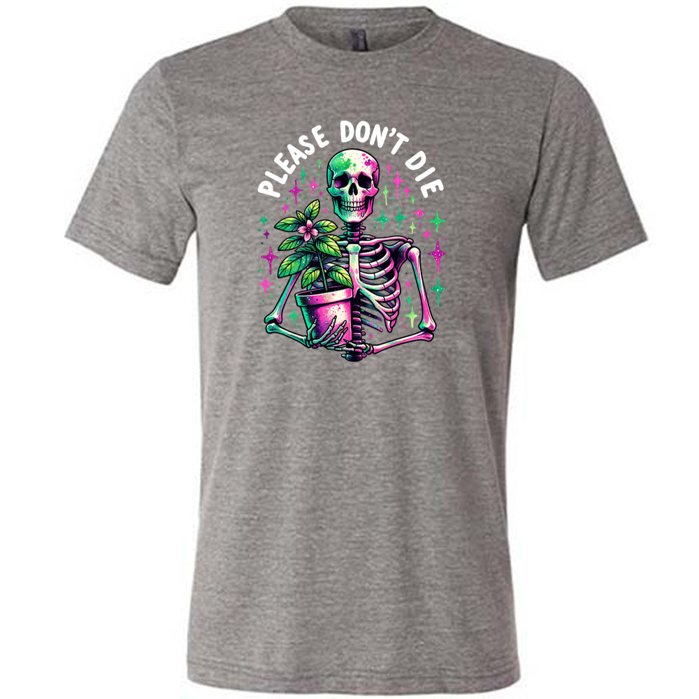 Grey colored shirt with a skeleton holding a plant graphic on it that says "Please Don't Die"