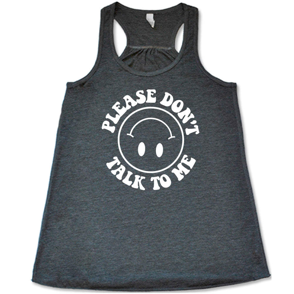 grey flowy tank with the words "please don't talk to me" creating mirrored arcs around the outlined circle graphic of an upside-down happy face