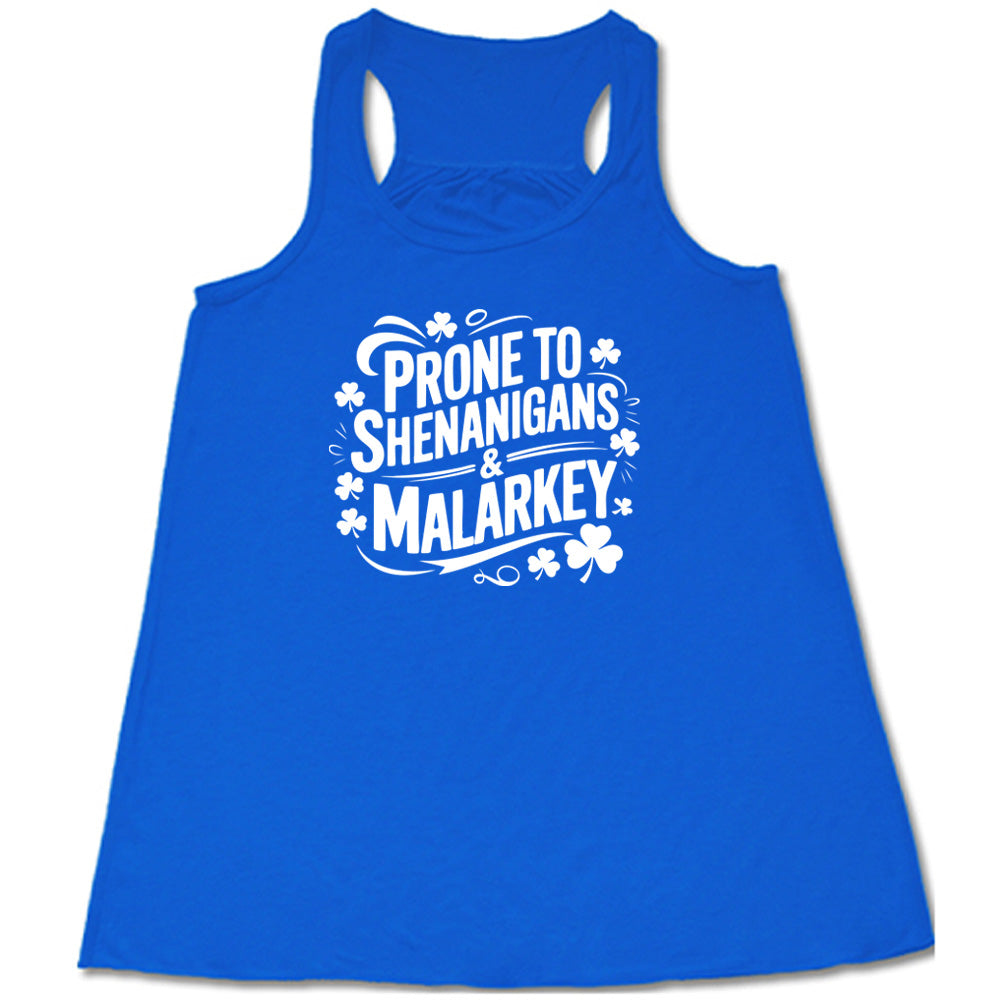 blue shirt with the quote "Prone To Shenanigans & Malarkey" on it