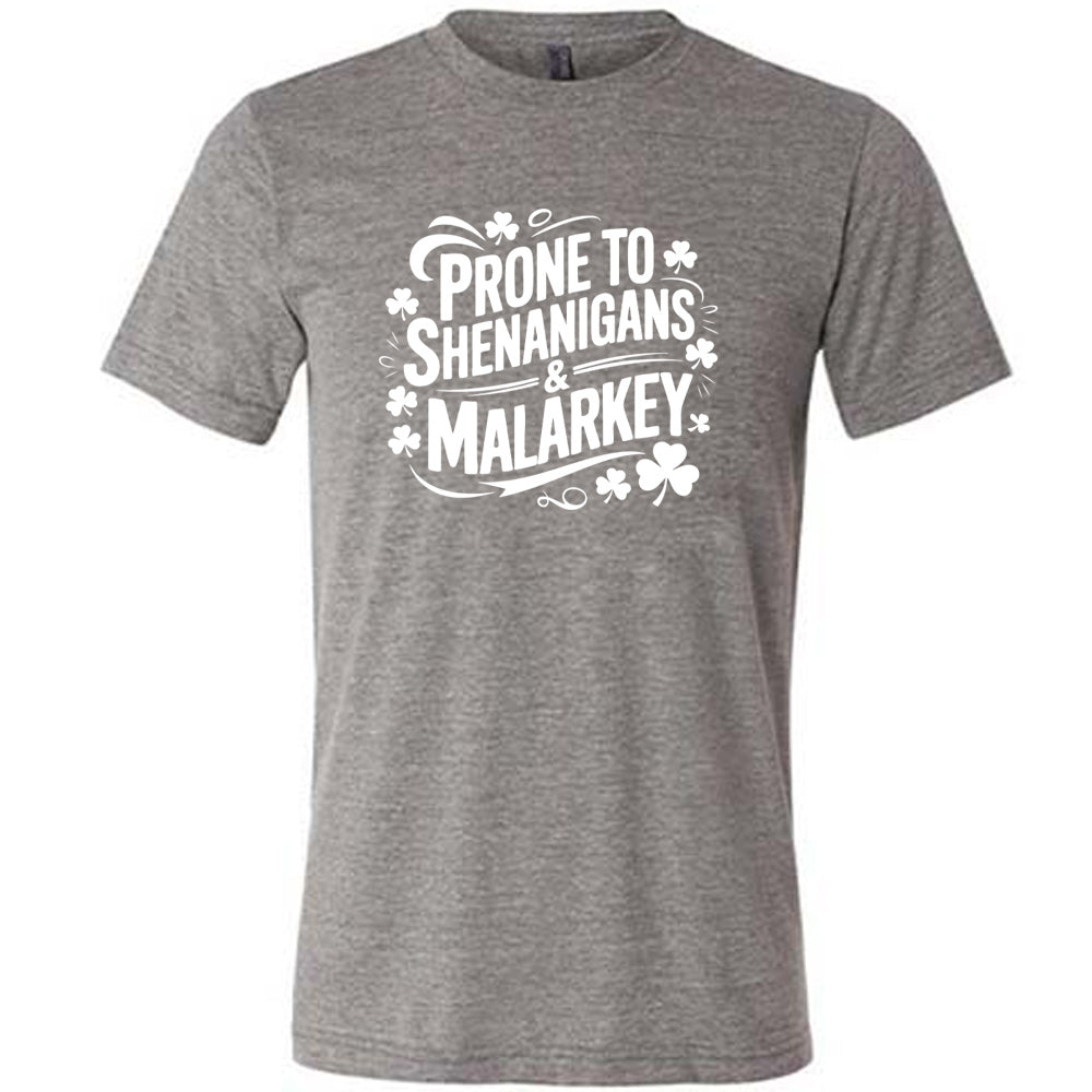 grey shirt with the quote "Prone To Shenanigans & Malarkey" on it