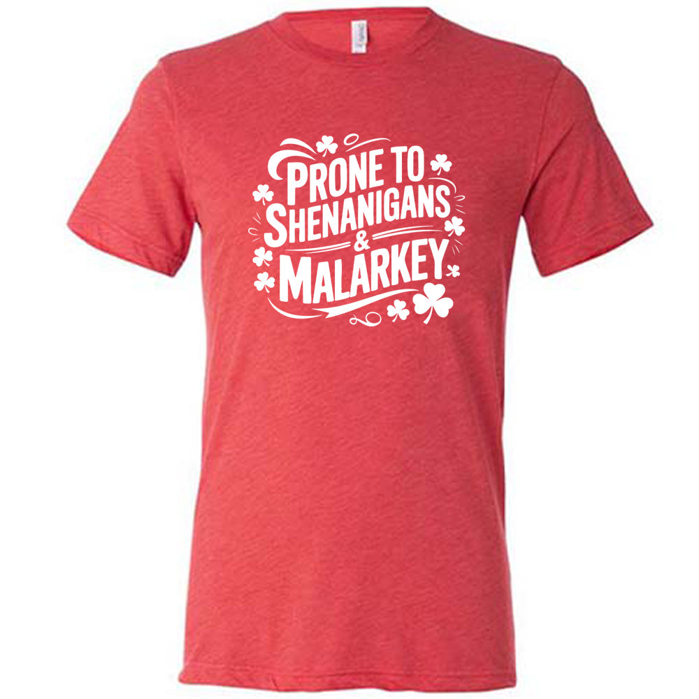 red shirt with the quote "Prone To Shenanigans & Malarkey" on it