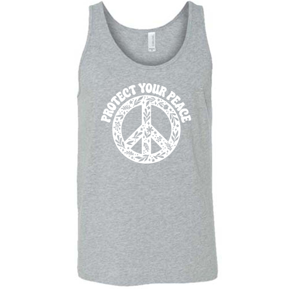 grey shirt with the text "protect your peace" and a peace sign graphic on it