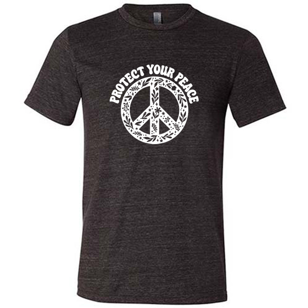 black shirt with the text "protect your peace" and a peace sign graphic on it