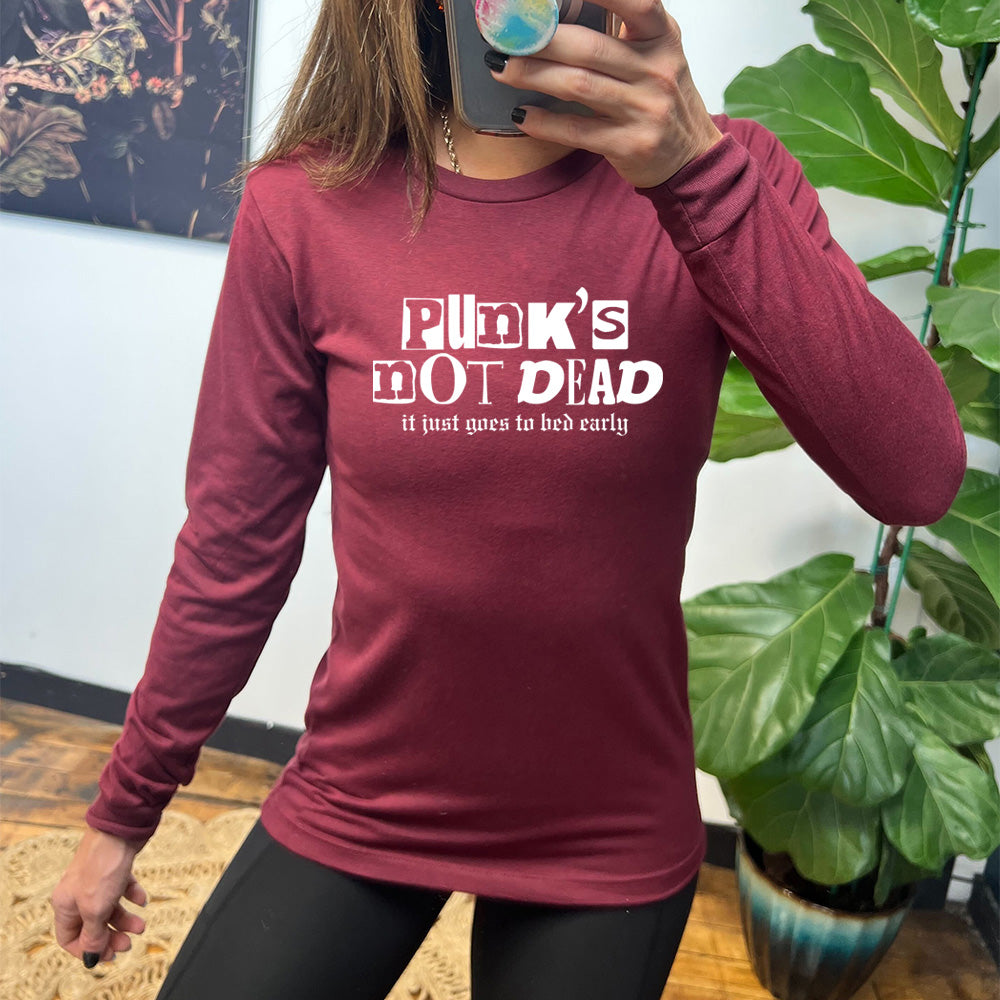 heather cardinal long sleeve shirt with the text "Punk's Not Dead, It Just Goes To Bed Early" on it