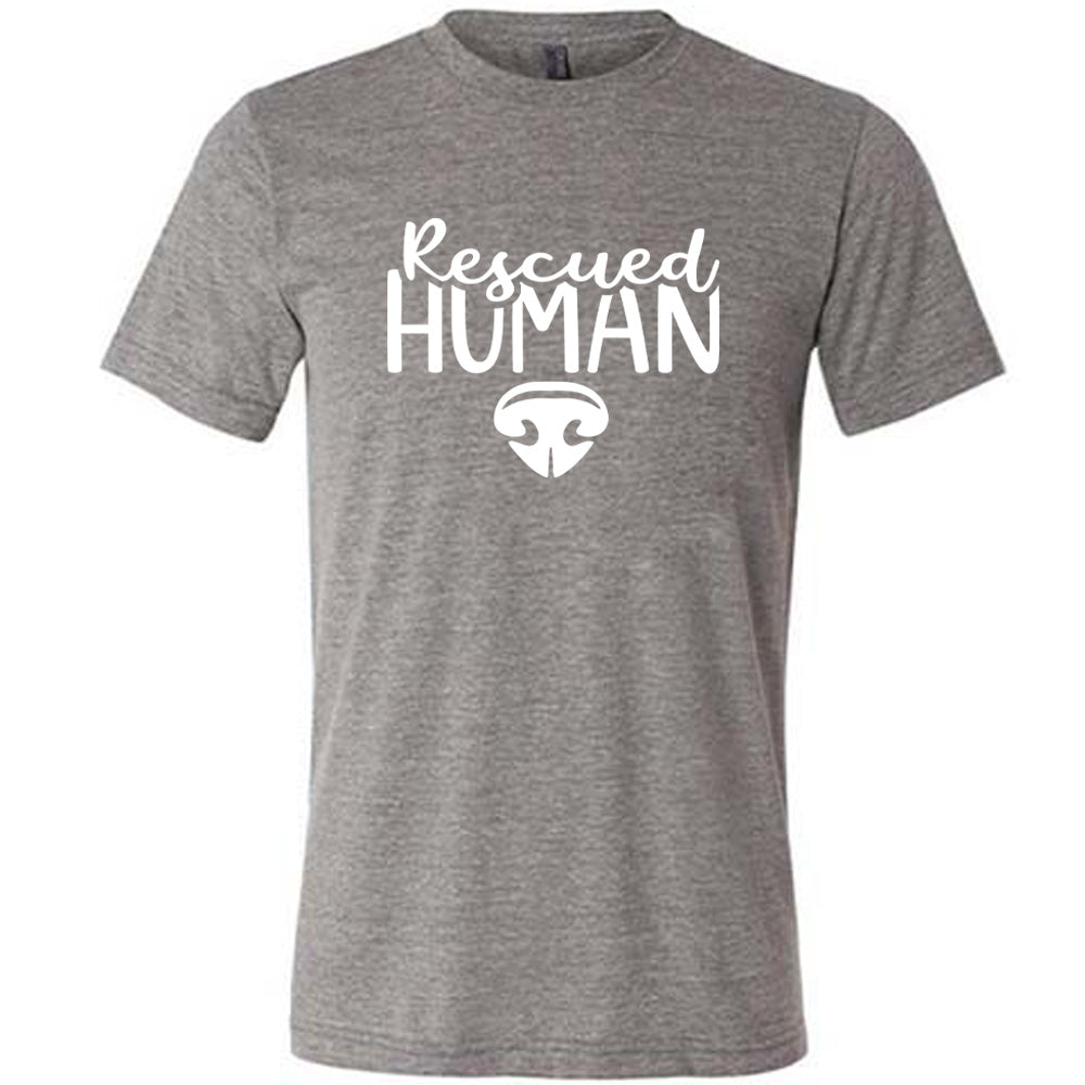 Grey colored shirt with dog nose graphic on it that says "Rescued Human"