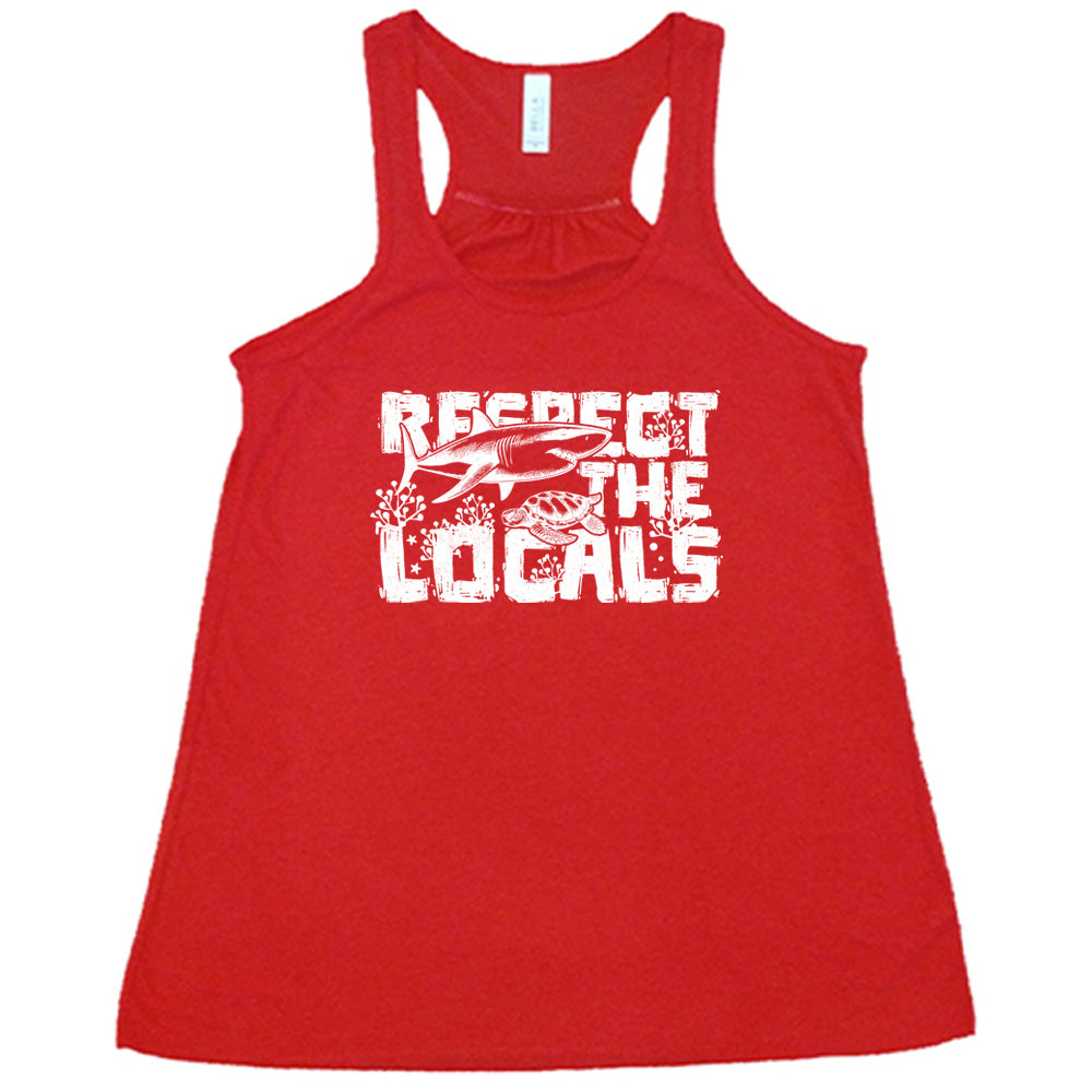 Red colored flowy tank with a shark and turtle graphic on it that says "Respect The Locals"