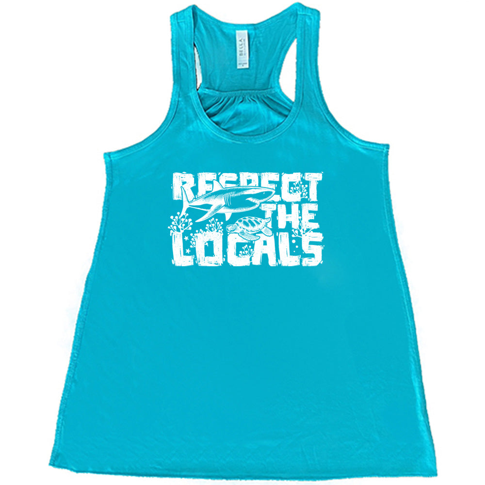 Teal colored flowy tank with a shark and turtle graphic on it that says "Respect The Locals"