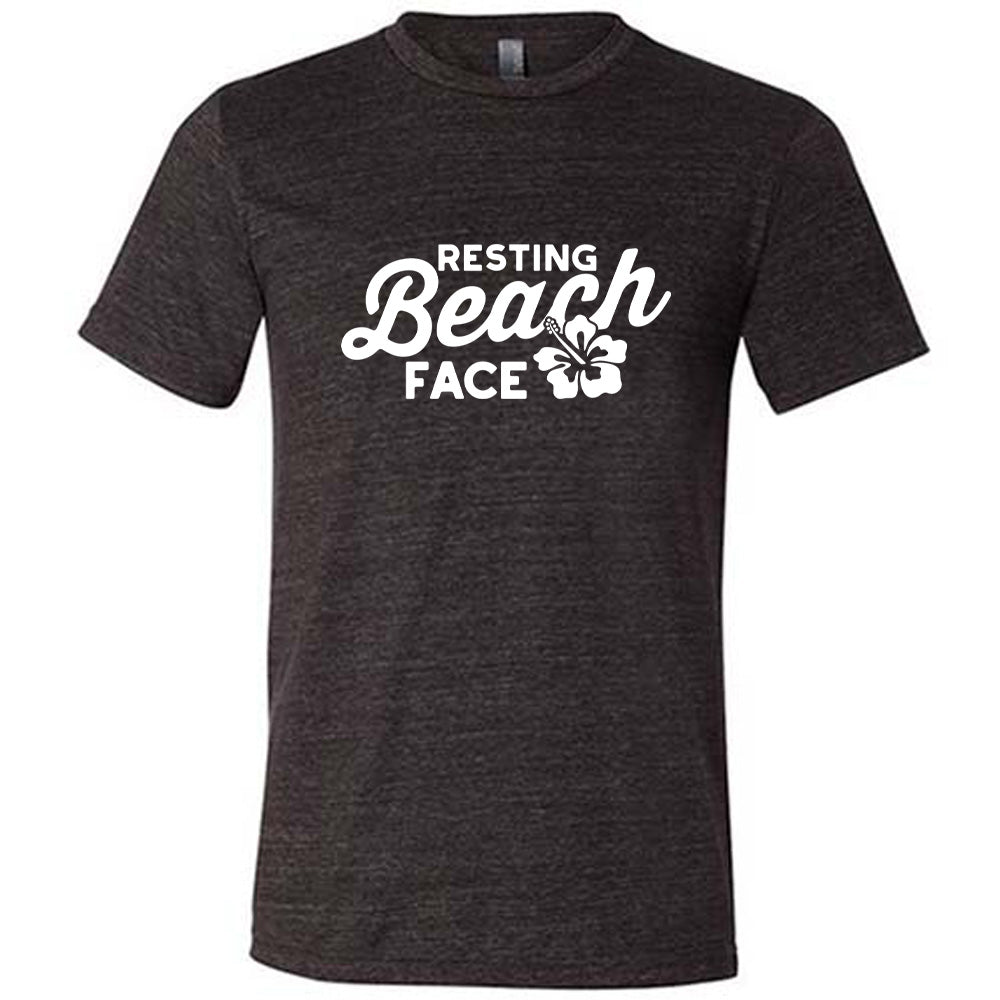 Black colored shirt with a flower graphic on it that says "Resting Beach Face"