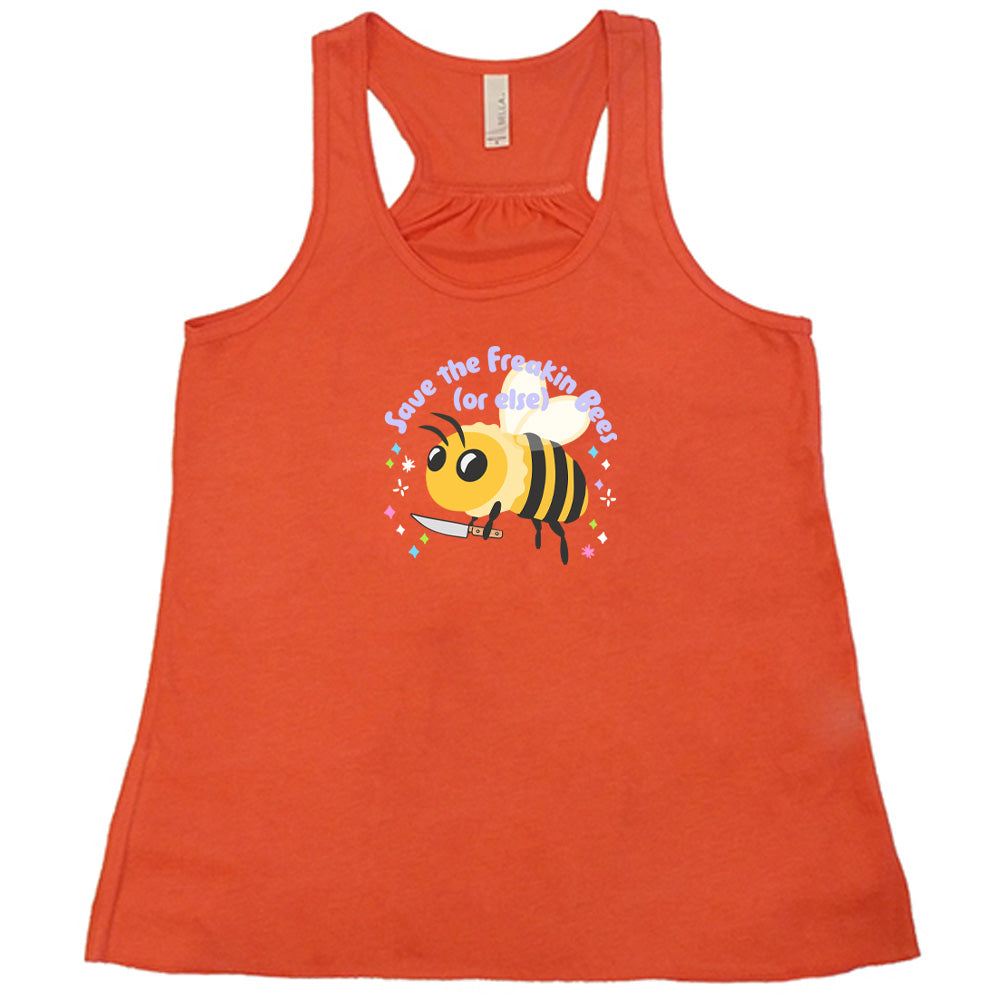Coral colored flowy tank with a bee holding a knife graphic on it that says "Save The Freakin Bees (Or Else)"