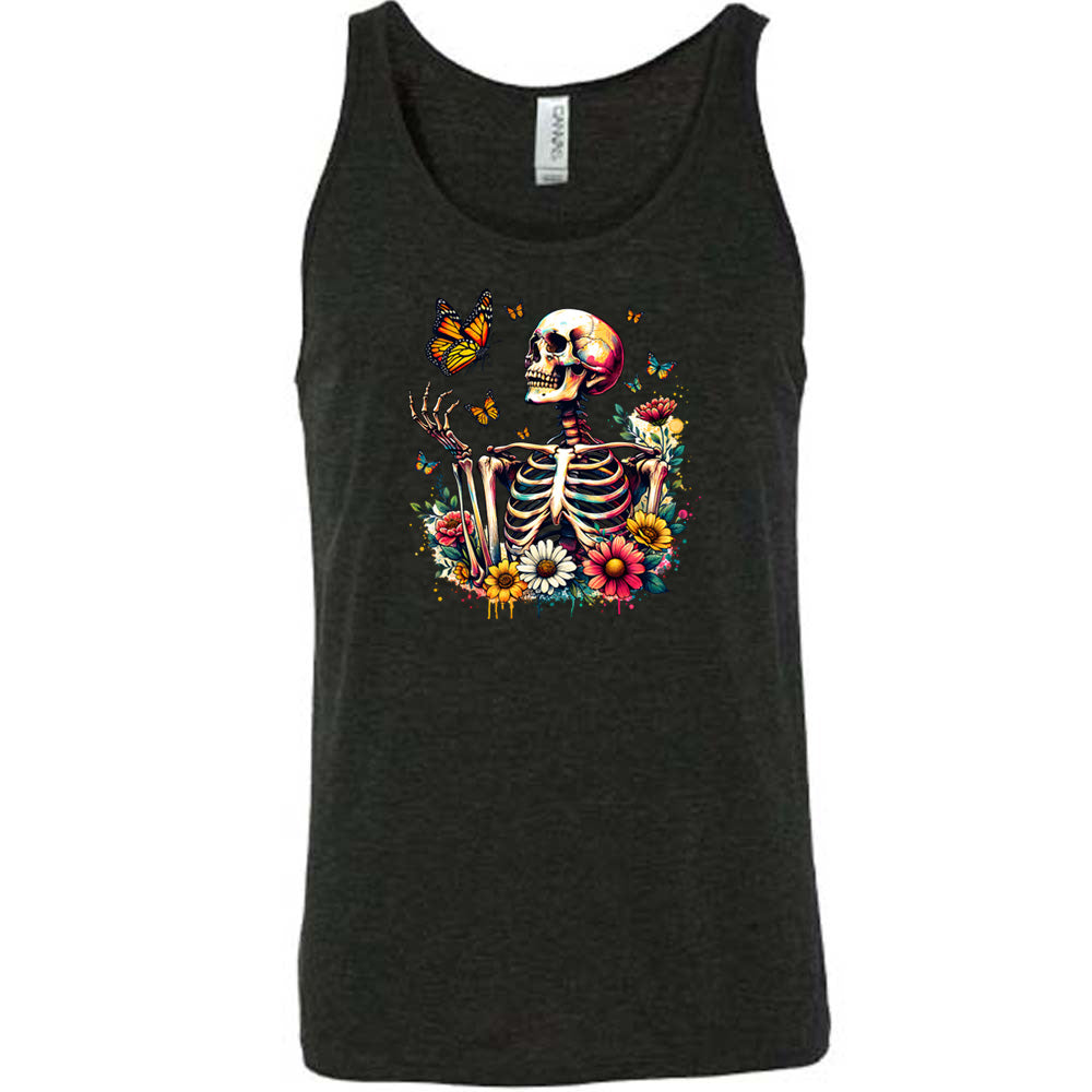 Black colored tank with a skeleton, butterflies, and flowers graphic on it