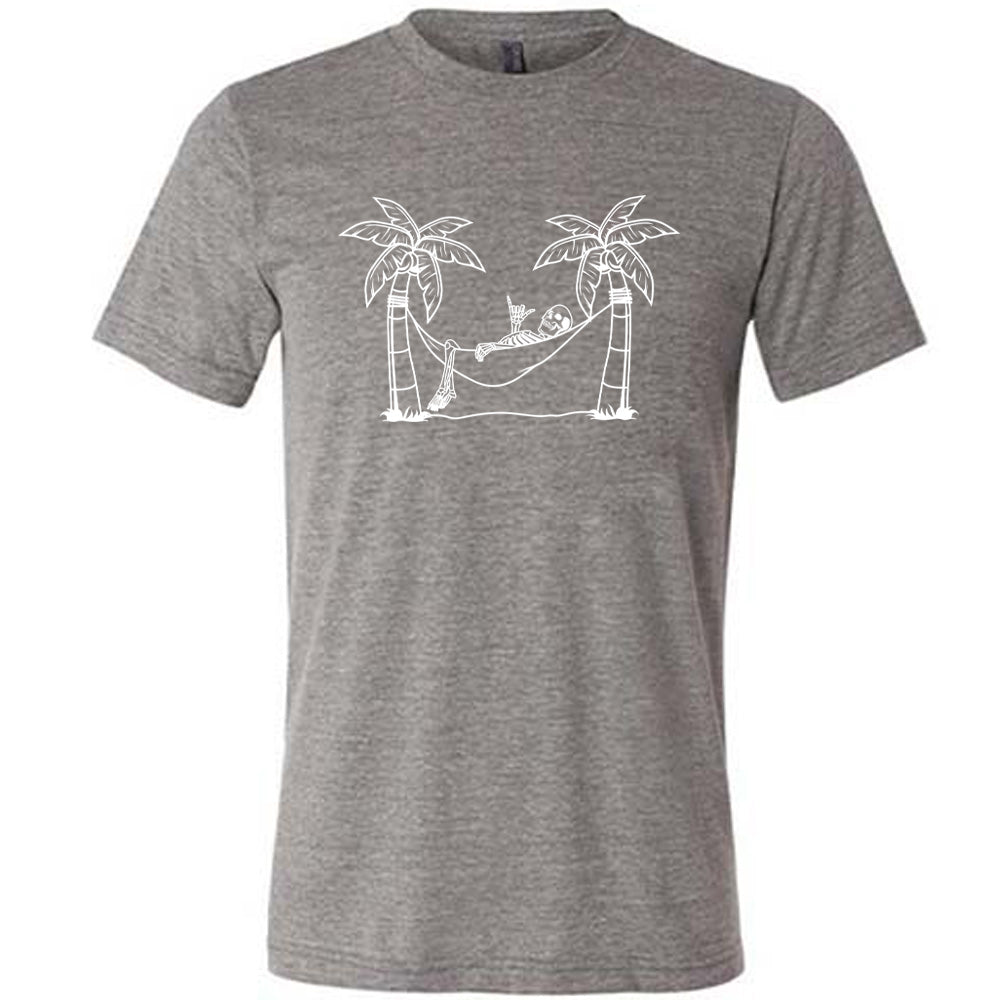 Grey colored shirt with a skeleton on a hammock graphic on it