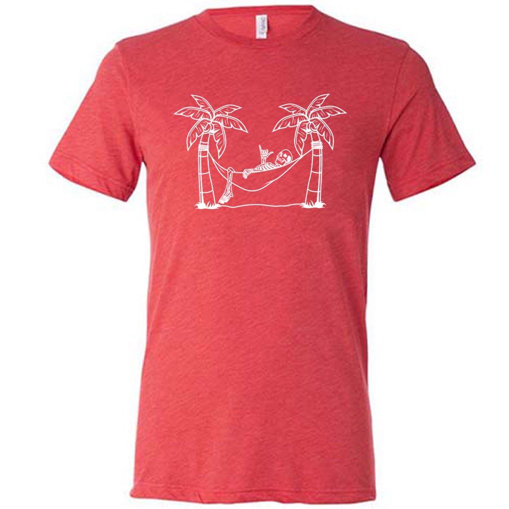 Red colored shirt with a skeleton on a hammock graphic on it