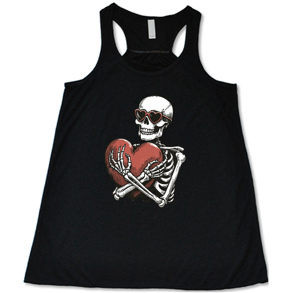 black shirt with a skeleton hugging a heart graphic on it