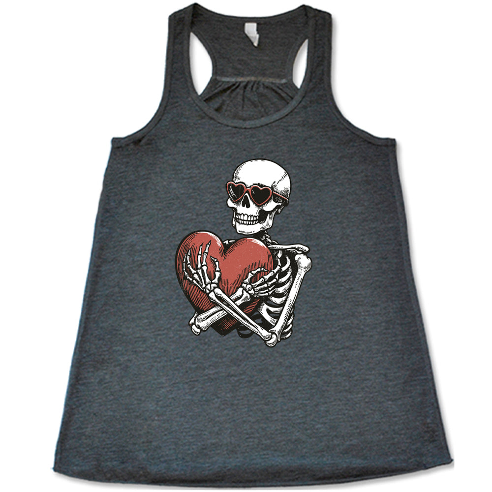 grey shirt with a skeleton hugging a heart graphic on it