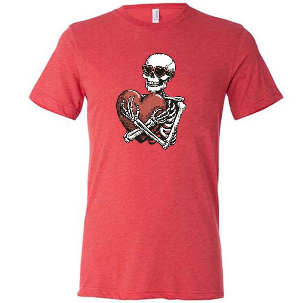 red shirt with a skeleton hugging a heart graphic on it