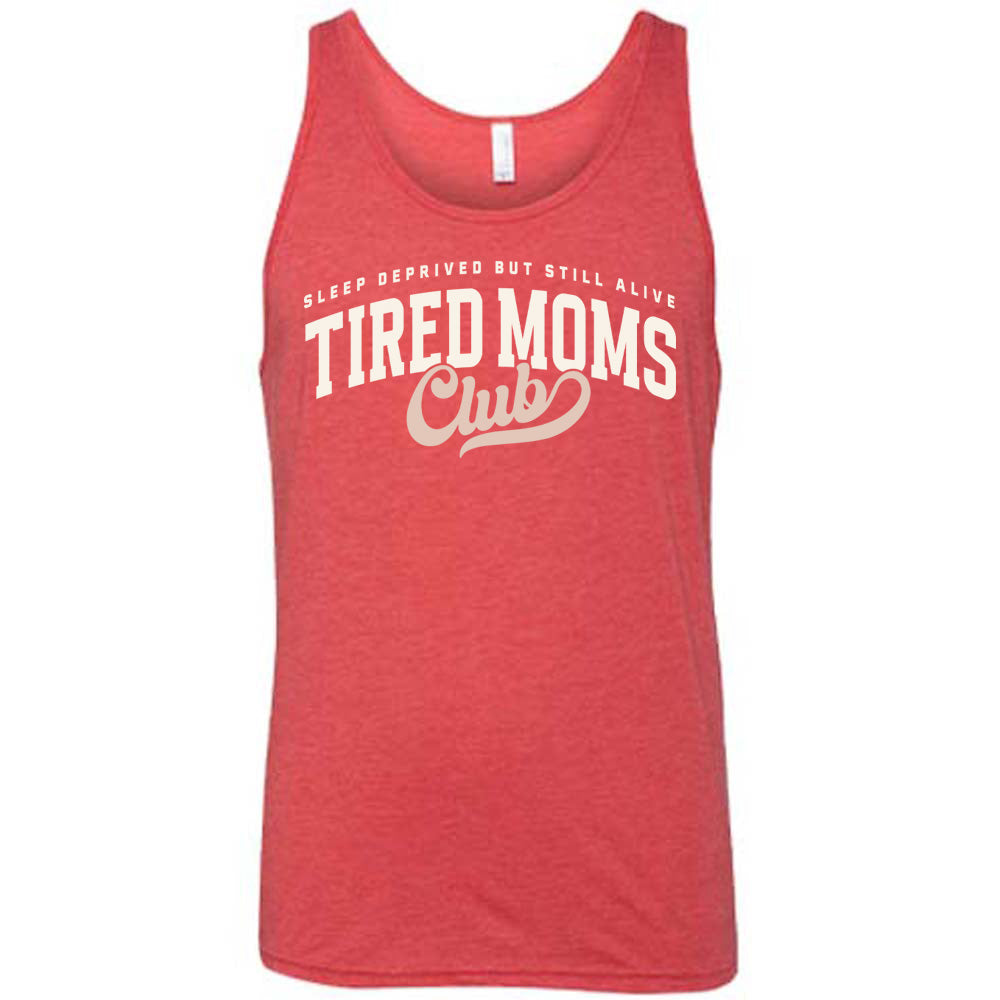 red unisex tank with the words "sleep deprived but still alive" in smaller letters, and "tired moms club" in large letters