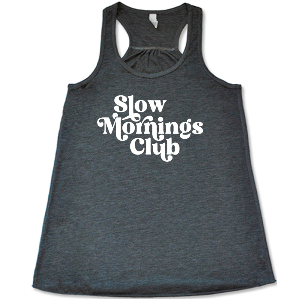 Grey colored flowy tank with a graphic on it that says "Slow Mornings Club"