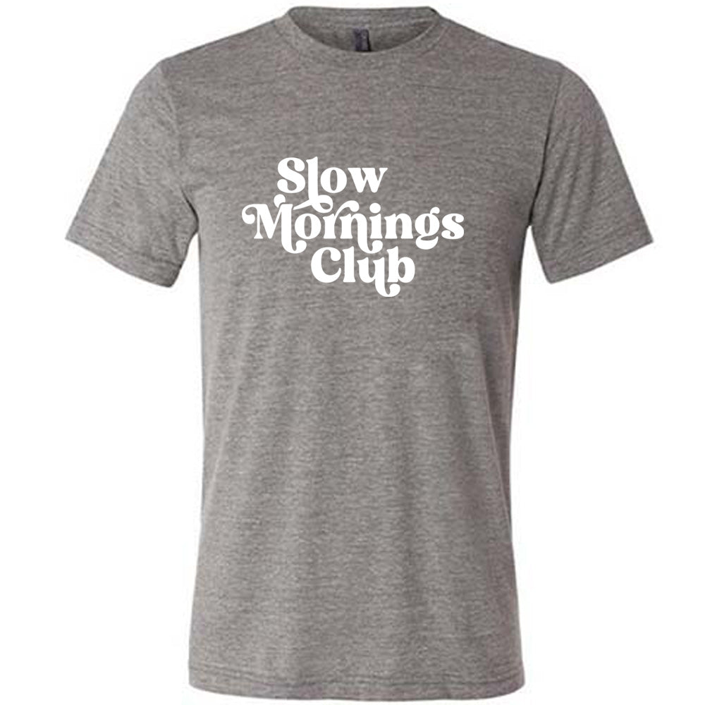 Grey colored shirt with a graphic on it that says "Slow Mornings Club"