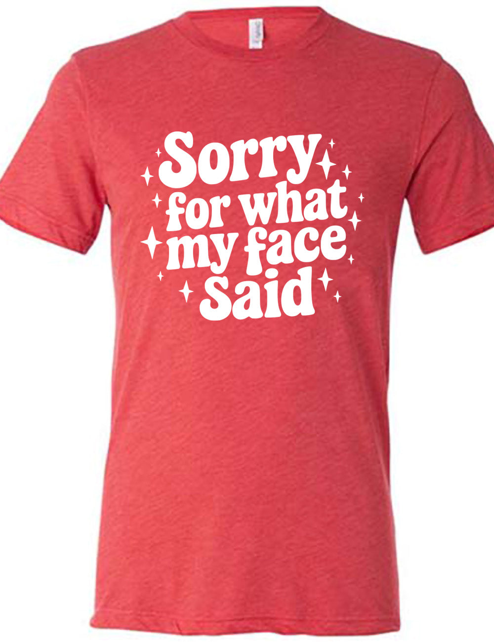 red unisex tee with the words, surrounded by stars, saying " sorry for what my face said"