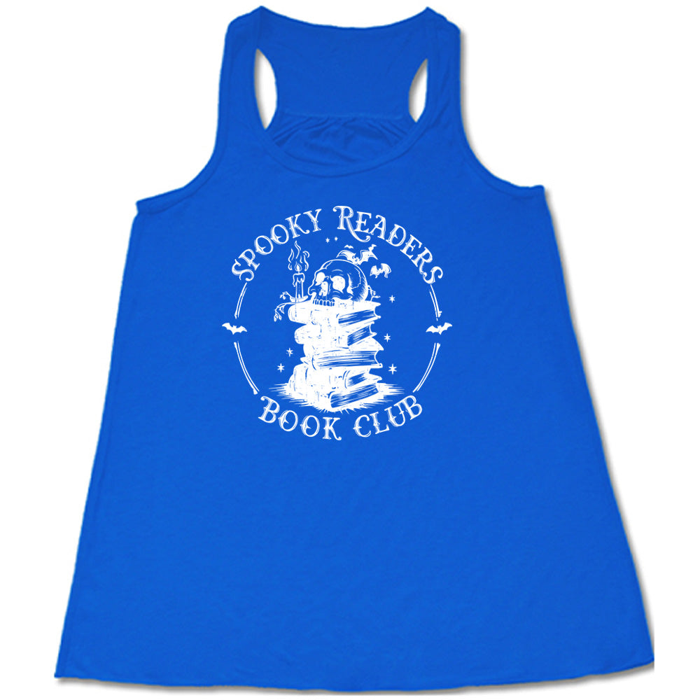 Blue colored flowy tank with skull on a stack of books graphic on it that says "Spooky Readers Book Club"