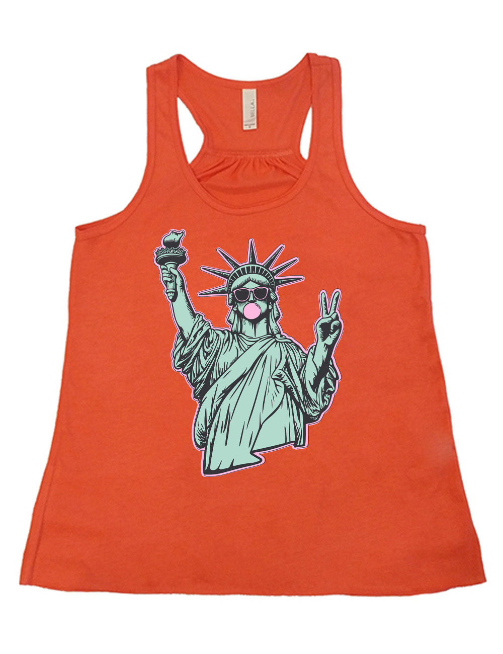 coral flowy racerback tank with the graphic of the statue of liberty, wearing sunglasses, blowing a gum bubble, and giving the peace sign