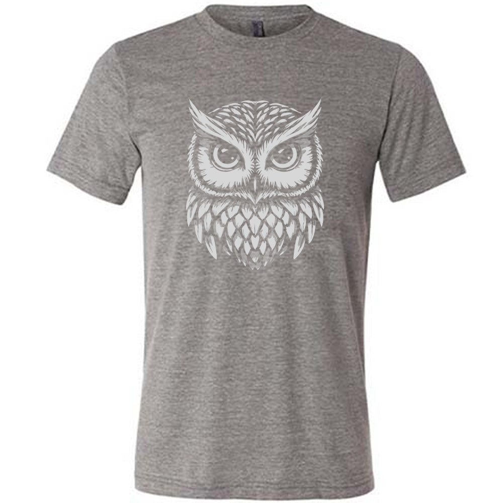 Grey colored shirt with stylized owl graphic on it