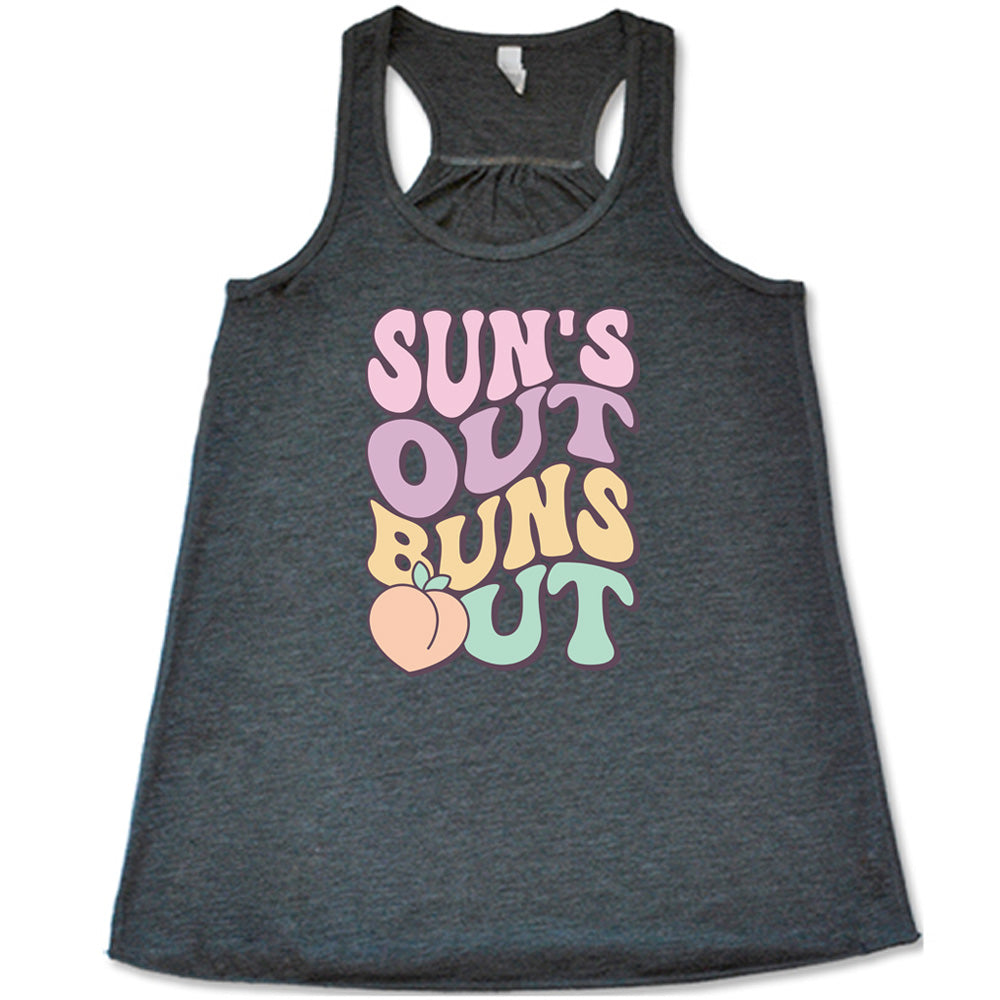 Grey colored flowy tank with a peach graphic on it that says "Suns Out Buns Out"