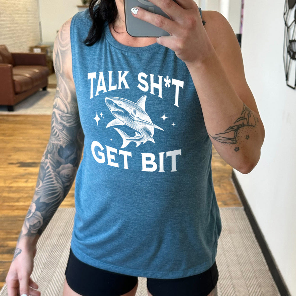 deep teal muscle tank with a shark graphic on it that says "Talk Shit Get Bit"